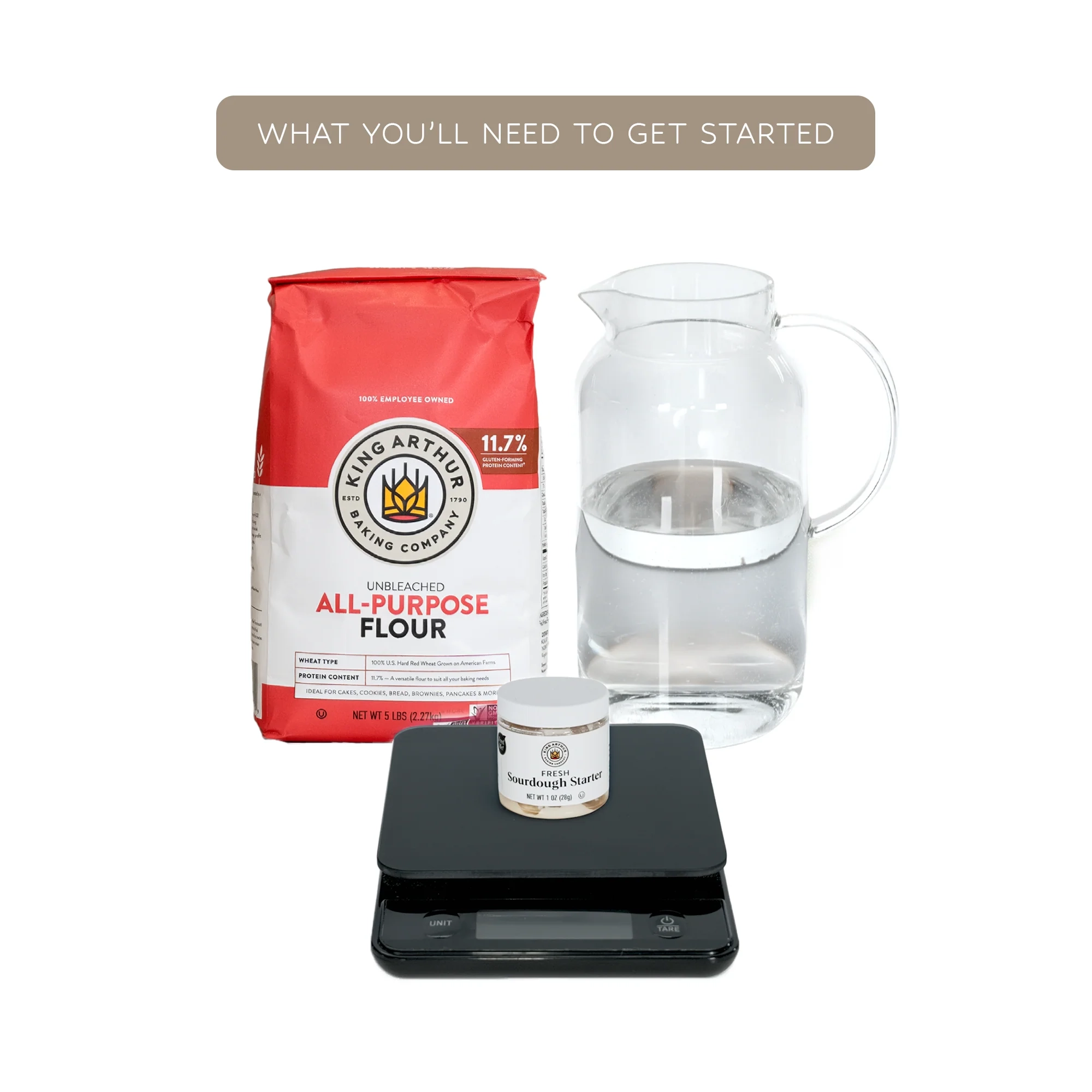 King Arthur Baking Company flour bag, pitcher of water, sourdough starter and a kitchen scale