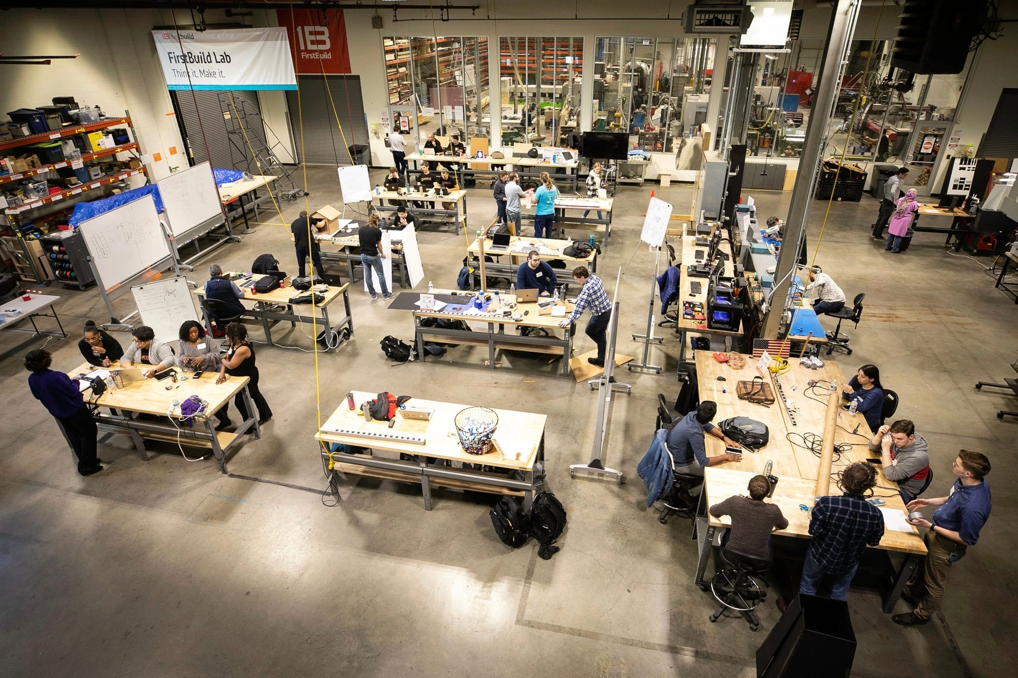 The FirstBuild workshop seen from above, with people working at tables