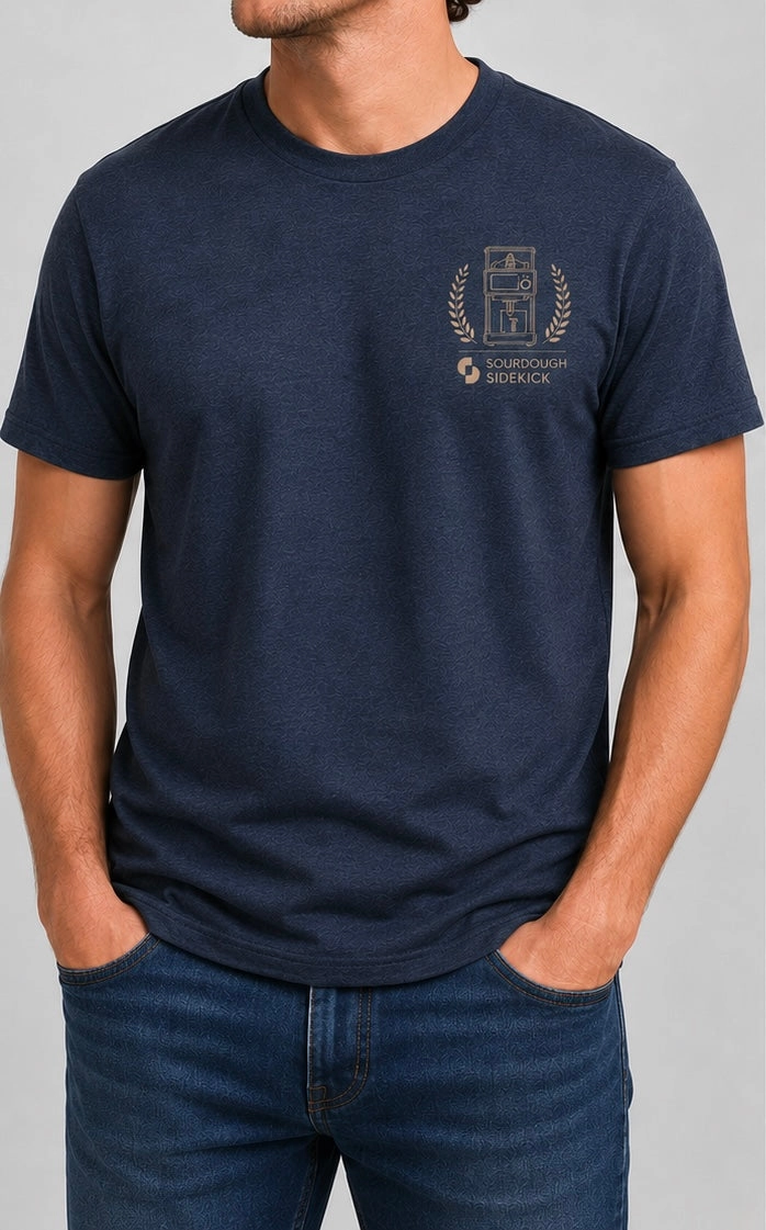 Person wearing a navy blue t-shirt with a Sourdough Sidekick pictured